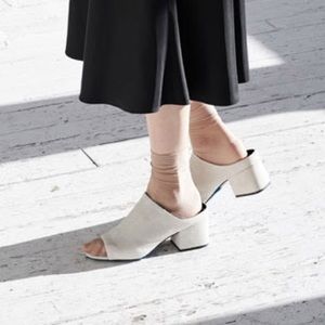 White naturalizer mule 7